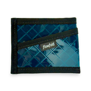 Blue wallet with black border and 'Flowfold' label on a white background