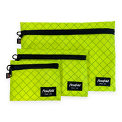 Set of three lime zipper pouches with black zippers and 'Flowfold' branding on a white background.