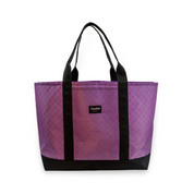 Purple tote bag with black handles and trim on a white background