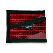 Red cardholder with black border and 'Flowfold' branding on a white background